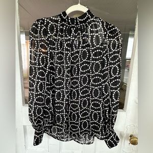 - Black and white long sleeved dress shirt